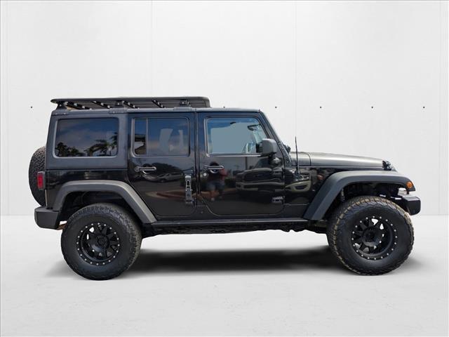 used 2012 Jeep Wrangler Unlimited car, priced at $16,509