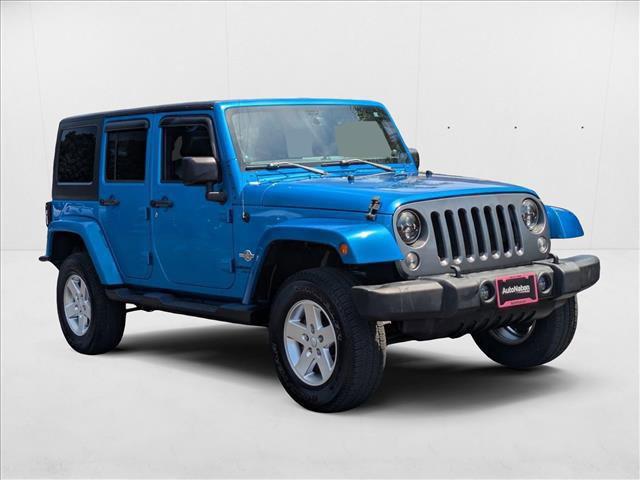 used 2014 Jeep Wrangler Unlimited car, priced at $16,345
