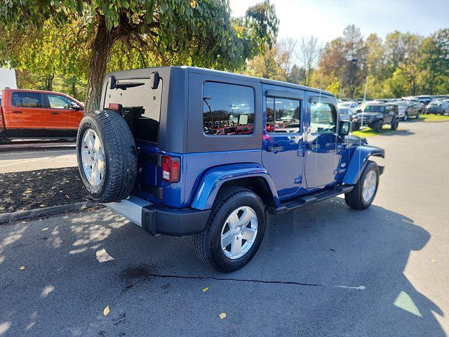 used 2010 Jeep Wrangler Unlimited car, priced at $13,500