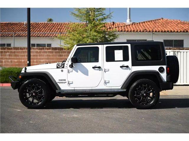 used 2015 Jeep Wrangler Unlimited car, priced at $16,688