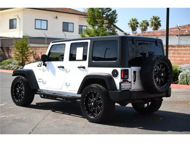 used 2015 Jeep Wrangler Unlimited car, priced at $16,688