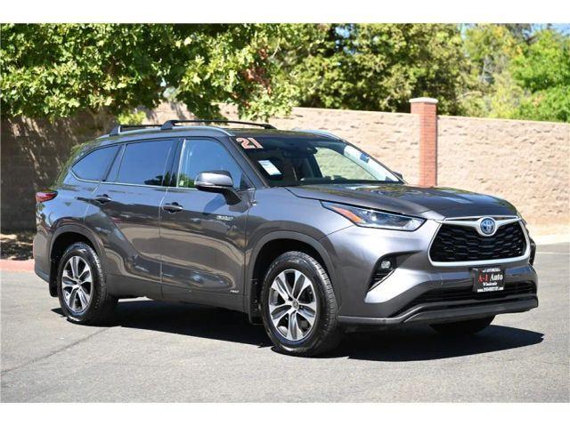 used 2021 Toyota Highlander Hybrid car, priced at $29,661