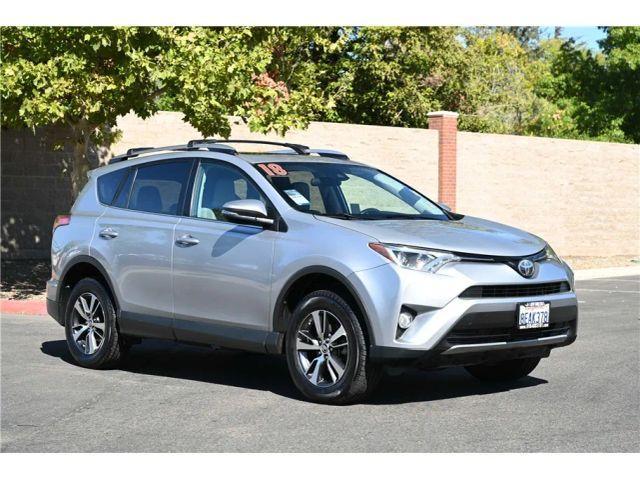 used 2018 Toyota RAV4 car, priced at $19,998