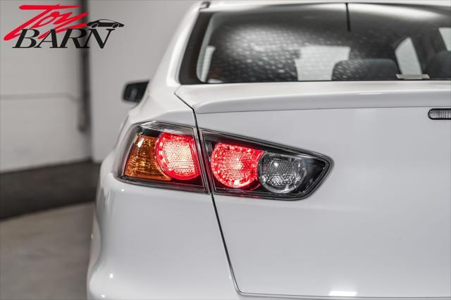 used 2014 Mitsubishi Lancer Evolution car, priced at $38,690