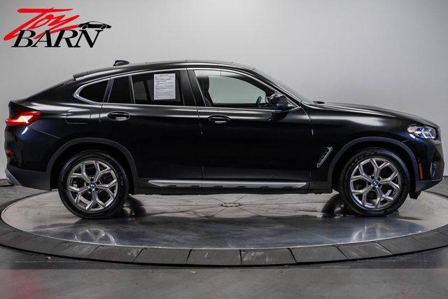 used 2022 BMW X4 car, priced at $38,990