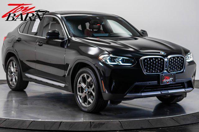 used 2022 BMW X4 car, priced at $38,990