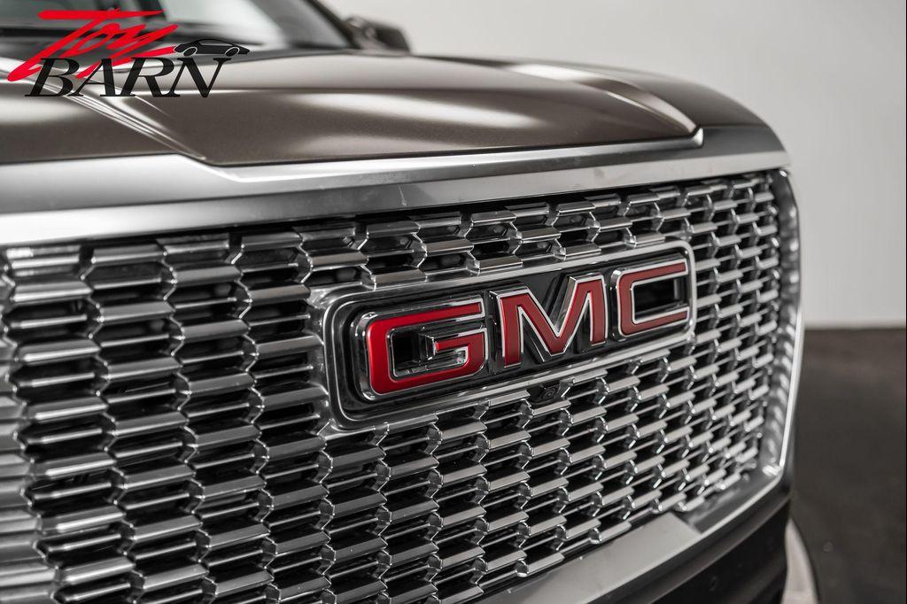 used 2021 GMC Yukon car, priced at $57,500
