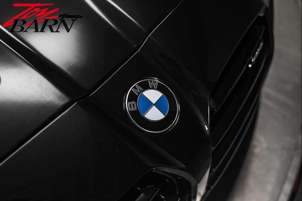 used 2022 BMW M4 car, priced at $65,990