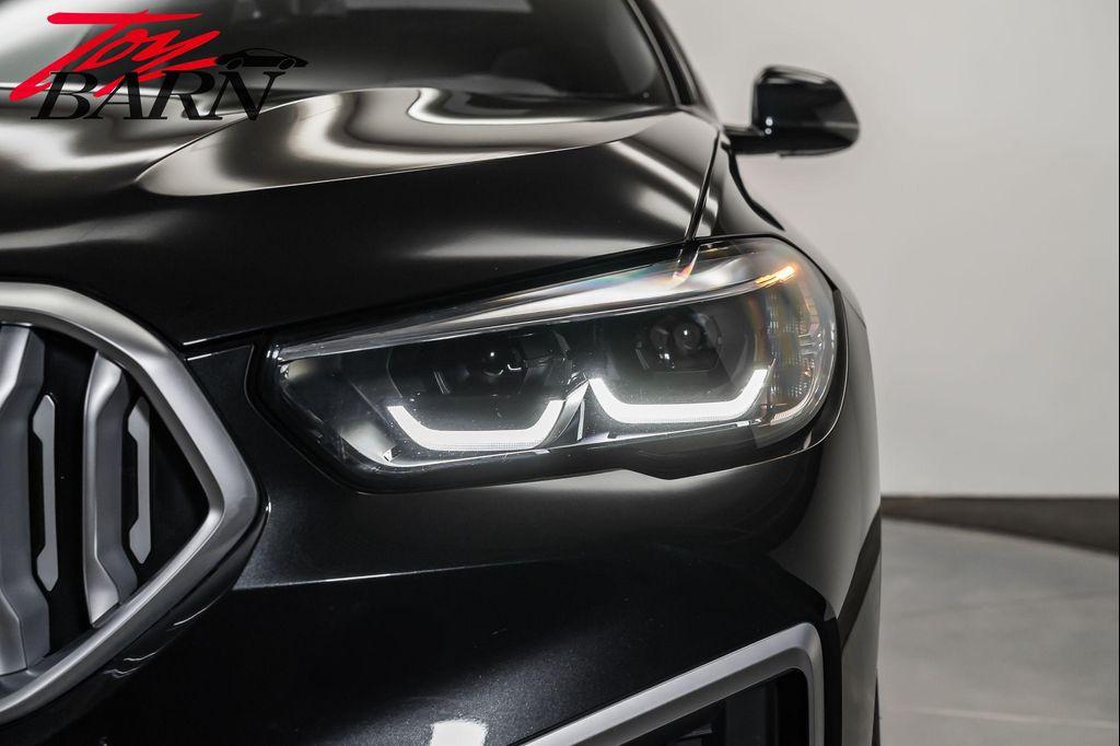 used 2023 BMW X6 car, priced at $57,490