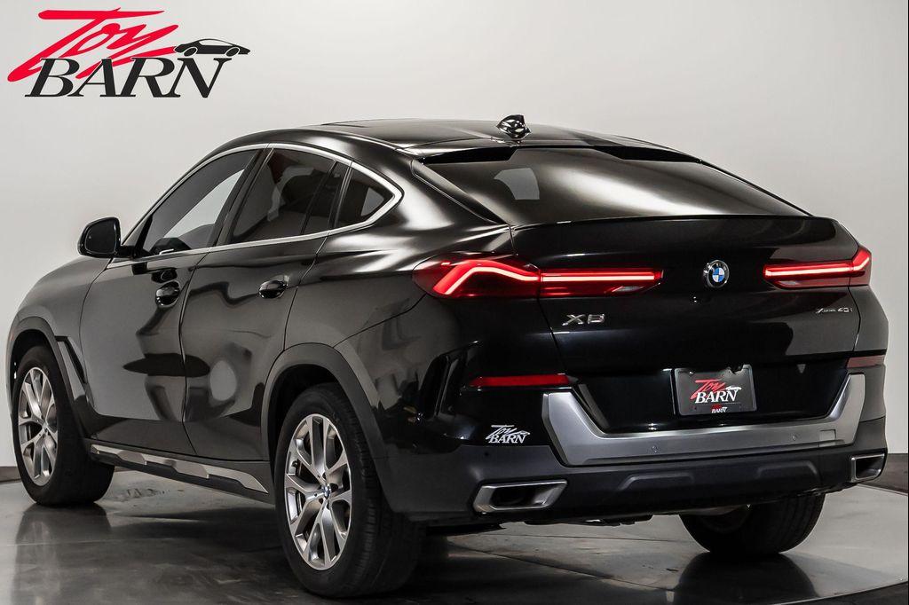 used 2023 BMW X6 car, priced at $57,490