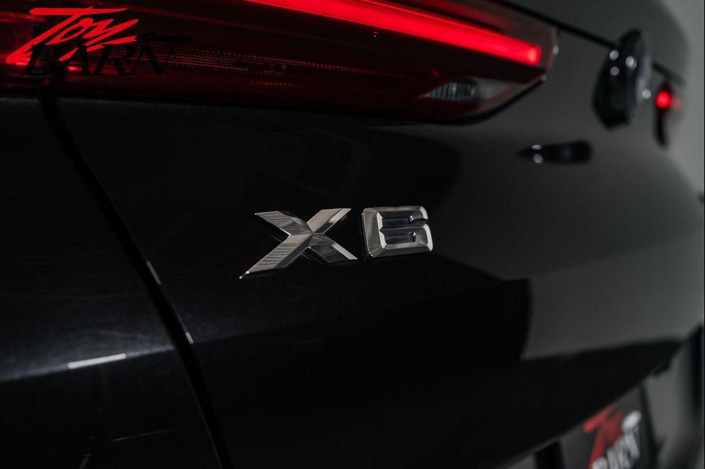 used 2023 BMW X6 car, priced at $57,490
