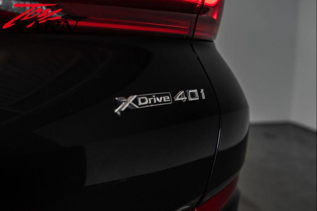 used 2023 BMW X6 car, priced at $57,490