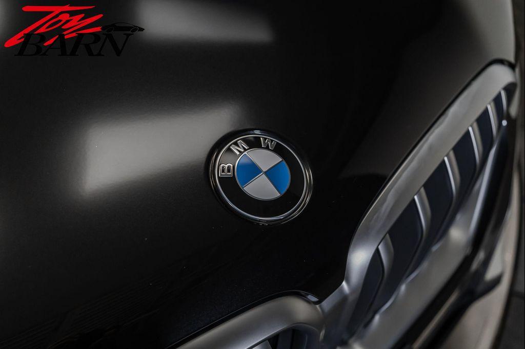 used 2023 BMW X6 car, priced at $57,490