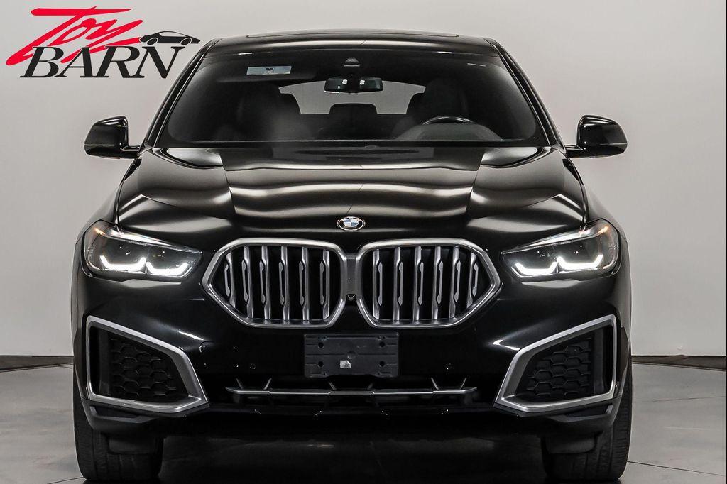 used 2023 BMW X6 car, priced at $57,490