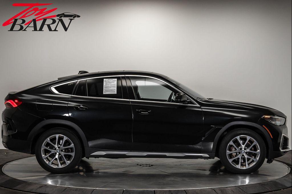 used 2023 BMW X6 car, priced at $57,490