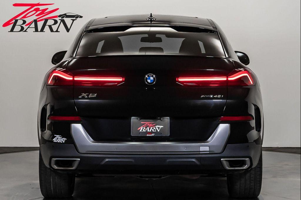 used 2023 BMW X6 car, priced at $57,490