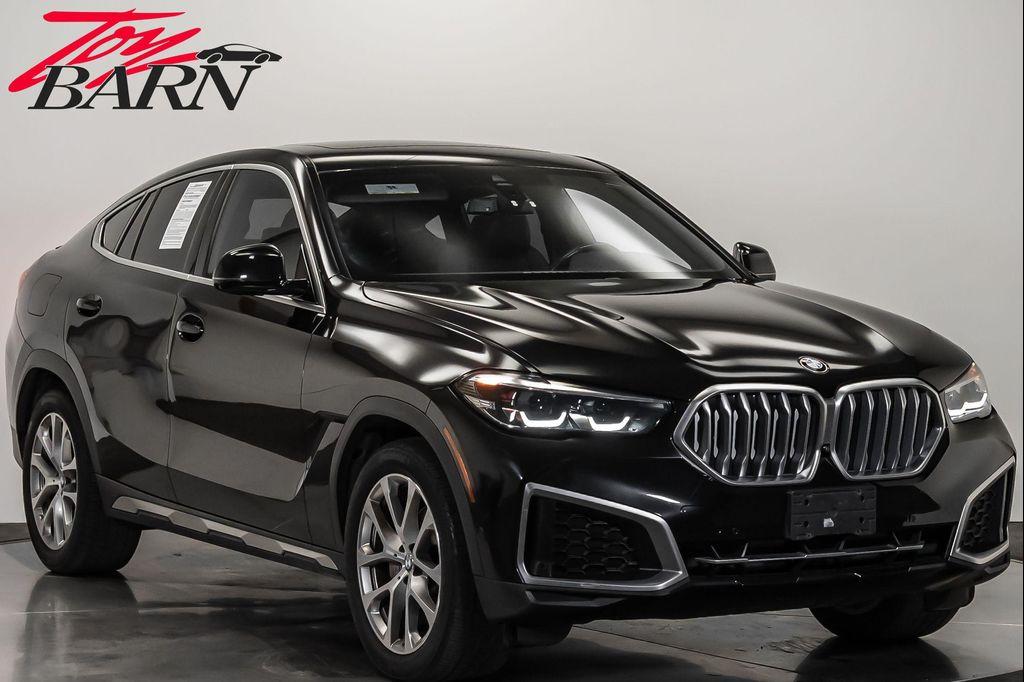 used 2023 BMW X6 car, priced at $57,490