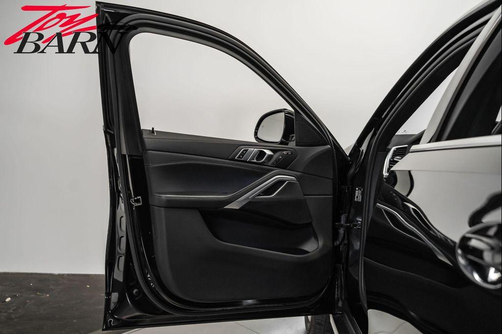 used 2023 BMW X6 car, priced at $57,490