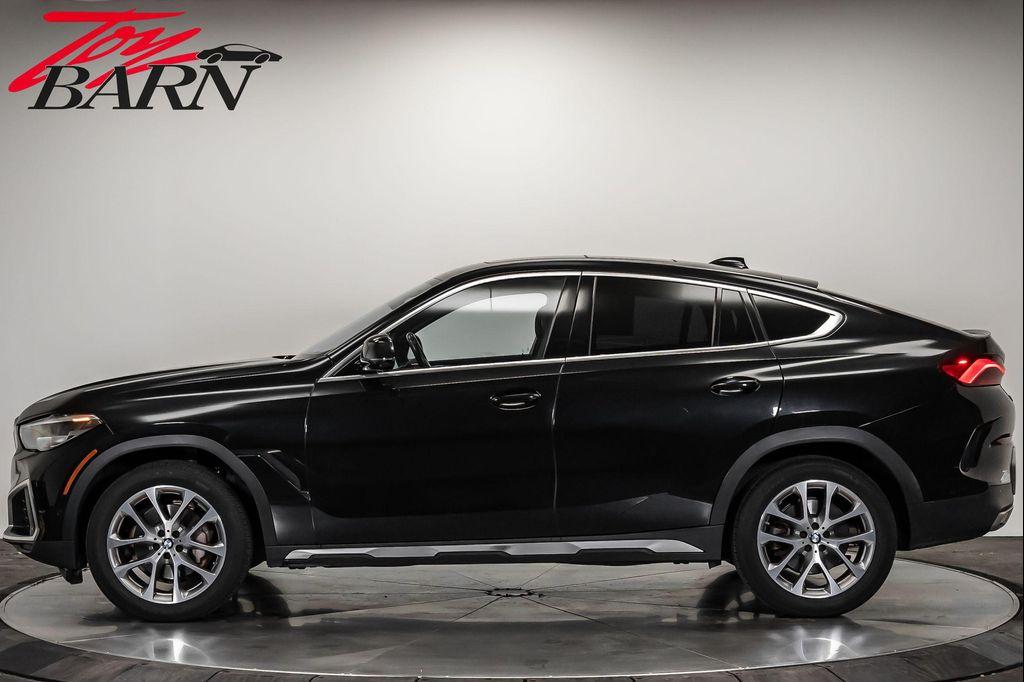 used 2023 BMW X6 car, priced at $57,490