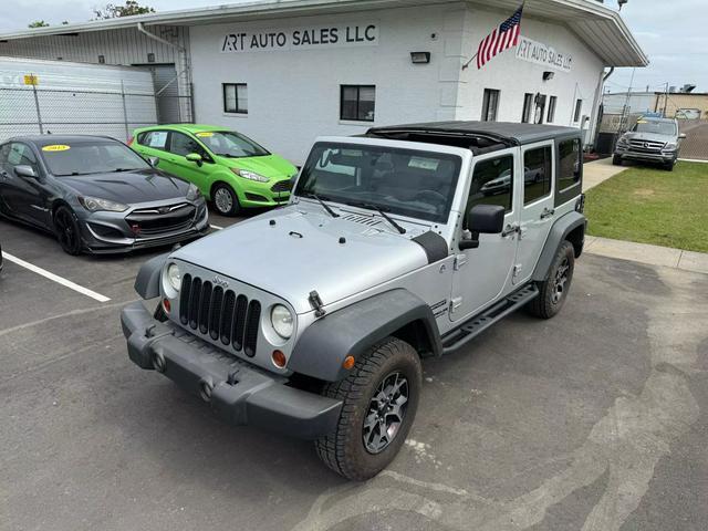 used 2012 Jeep Wrangler Unlimited car, priced at $14,799