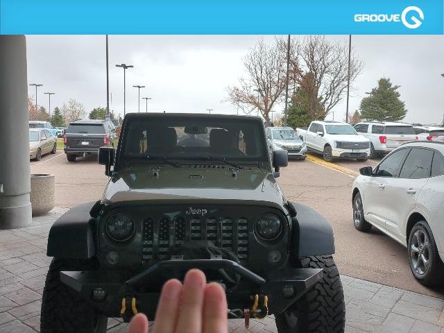 used 2015 Jeep Wrangler Unlimited car, priced at $23,590