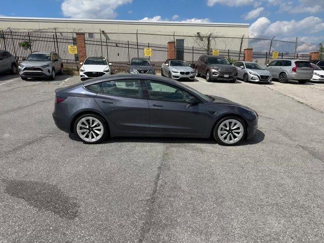 used 2023 Tesla Model 3 car, priced at $22,642