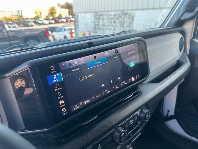 used 2025 Jeep Wrangler car, priced at $34,880