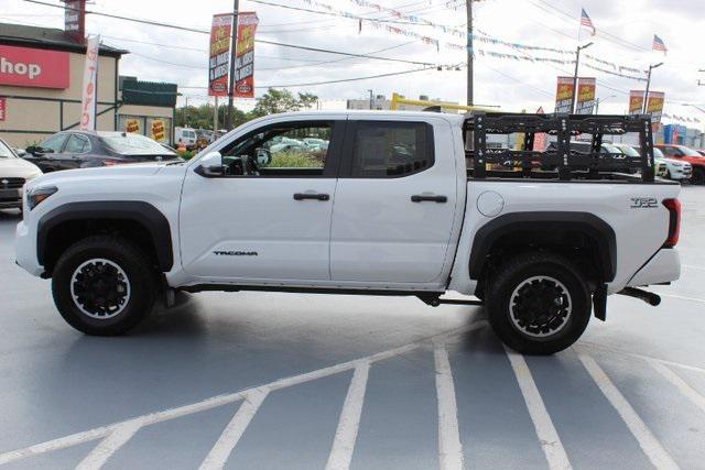 used 2024 Toyota Tacoma car, priced at $49,995