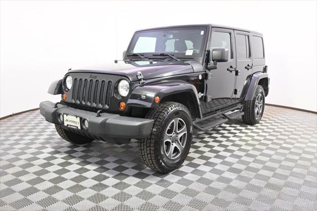 used 2013 Jeep Wrangler Unlimited car, priced at $19,388