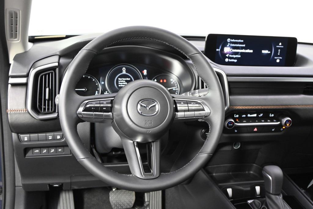 new 2025 Mazda CX-50 Hybrid car, priced at $36,521