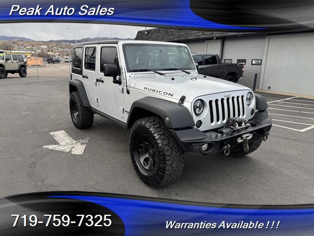 used 2012 Jeep Wrangler Unlimited car, priced at $17,405