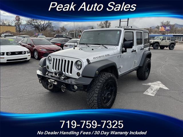 used 2012 Jeep Wrangler Unlimited car, priced at $16,687
