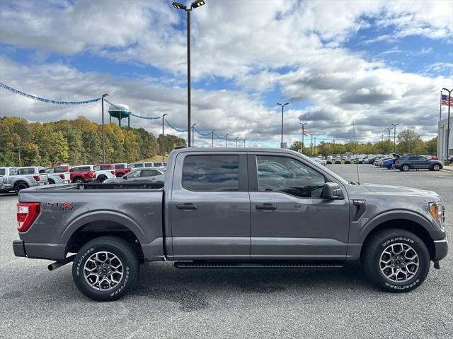 used 2021 Ford F-150 car, priced at $31,631