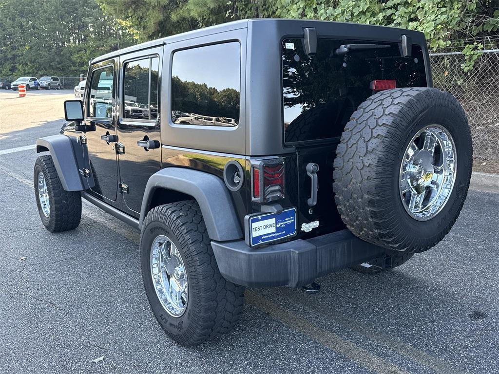used 2017 Jeep Wrangler Unlimited car, priced at $26,728