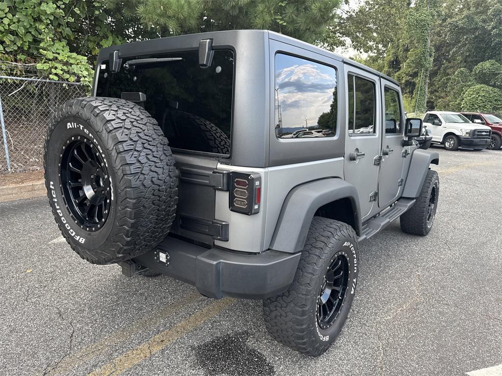 used 2013 Jeep Wrangler Unlimited car, priced at $15,750