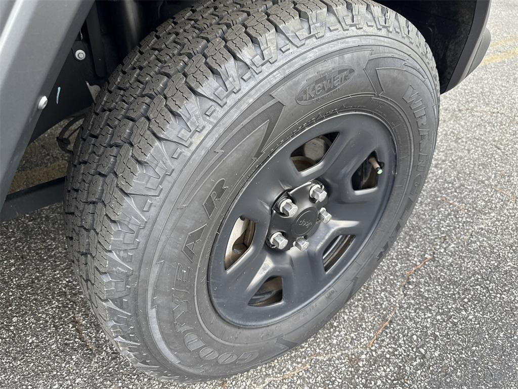 used 2023 Jeep Wrangler car, priced at $29,998