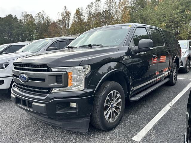 used 2018 Ford F-150 car, priced at $26,838