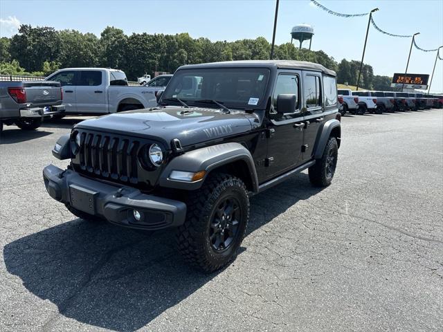 used 2021 Jeep Wrangler Unlimited car, priced at $33,611