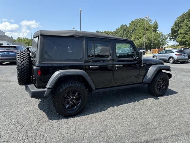 used 2021 Jeep Wrangler Unlimited car, priced at $33,611