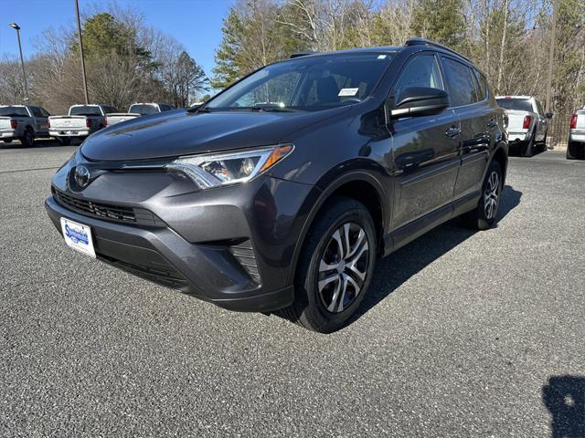 used 2018 Toyota RAV4 car, priced at $24,980