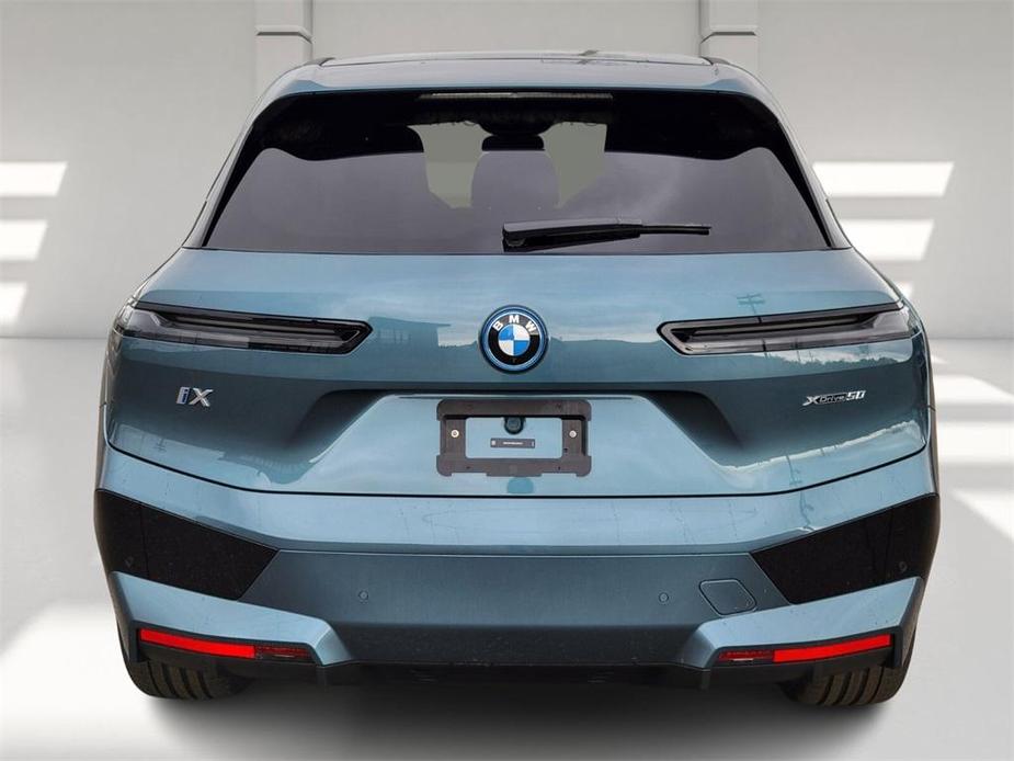 new 2025 BMW iX car, priced at $97,020