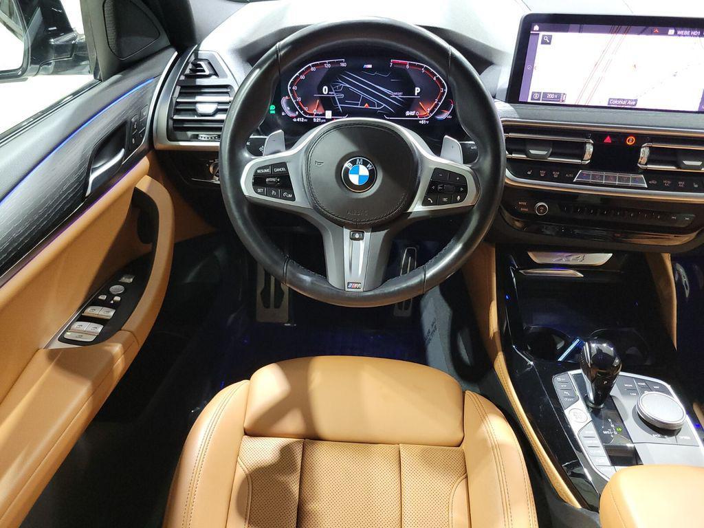 used 2023 BMW X4 car, priced at $44,191