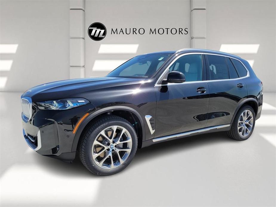 used 2025 BMW X5 car, priced at $67,410