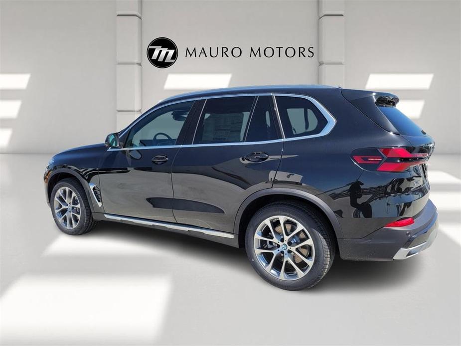 used 2025 BMW X5 car, priced at $67,410