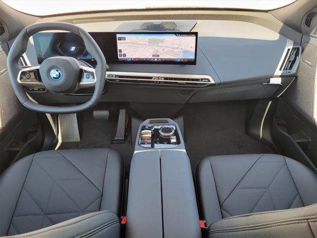 new 2025 BMW iX car, priced at $97,570