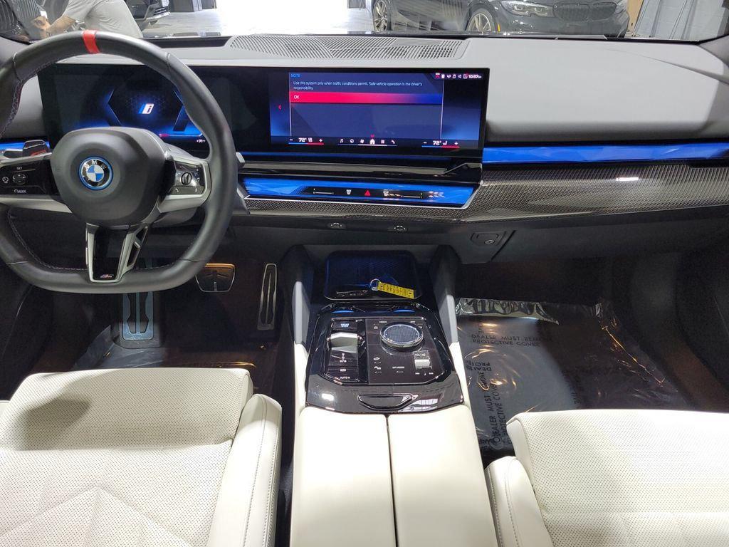 used 2024 BMW i5 car, priced at $58,894