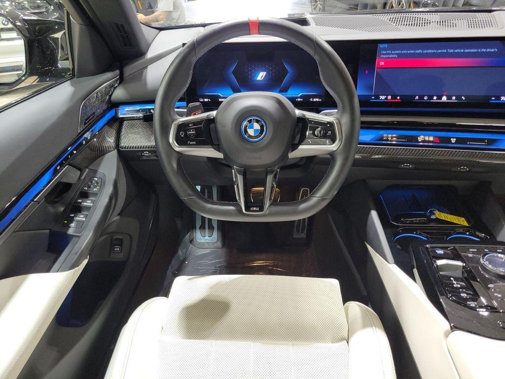 used 2024 BMW i5 car, priced at $58,894