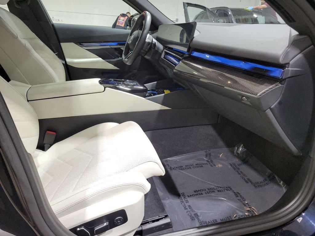 used 2024 BMW i5 car, priced at $58,894