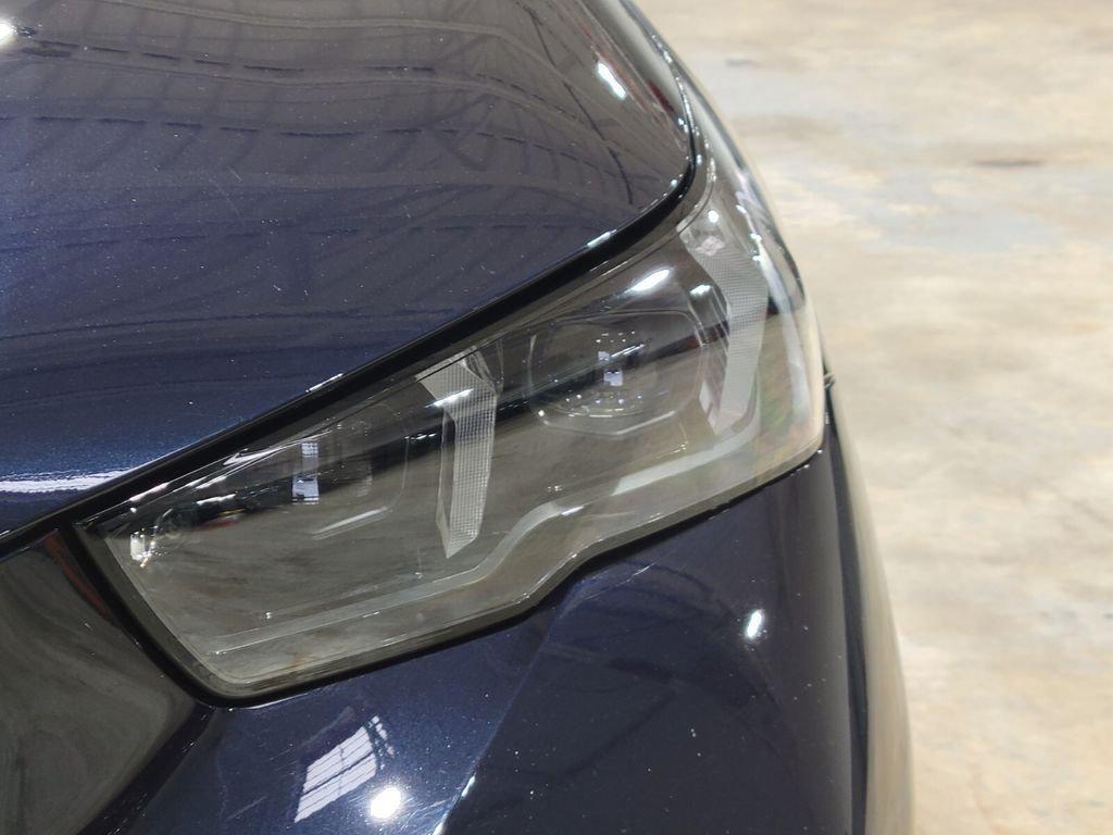 used 2024 BMW i5 car, priced at $58,894