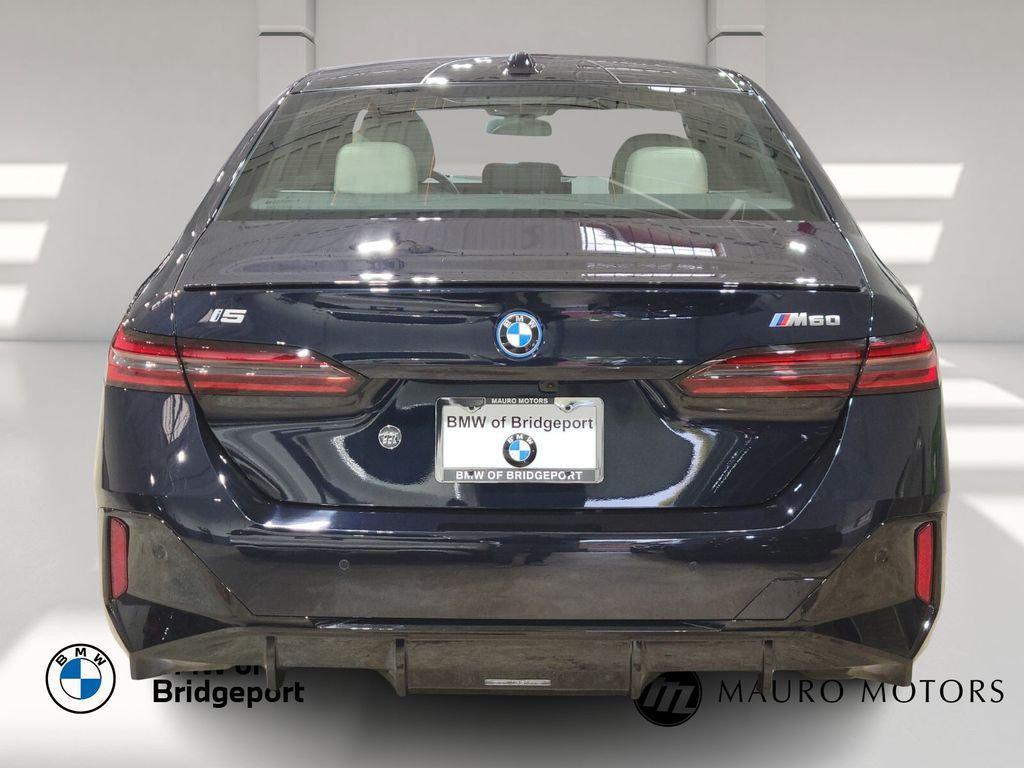 used 2024 BMW i5 car, priced at $58,894